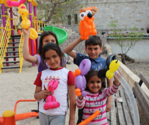 Happy kids in Turkey -- Can we have a world with more balloons and less violence?