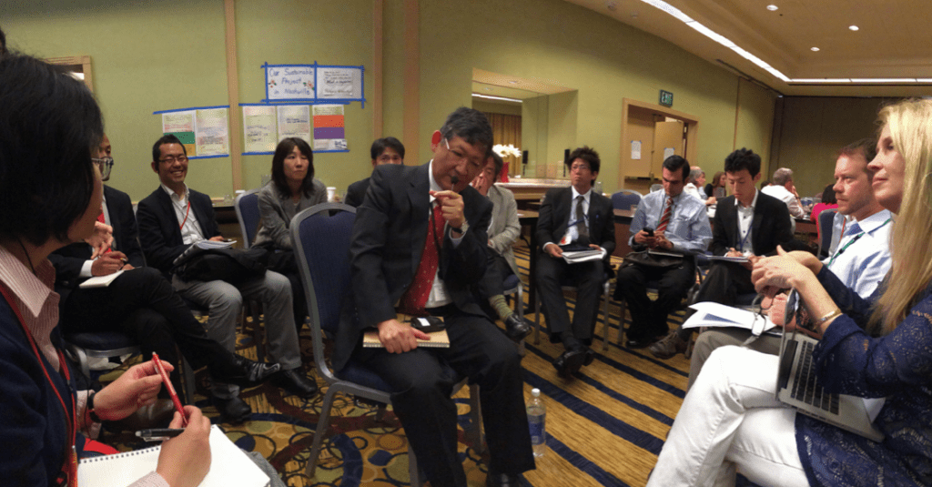 Discussion aided by translator (in the middle)